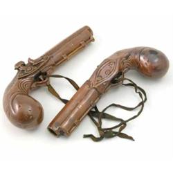 Two Stephen Green salt-glazed stoneware pistol flasks, circa 1830, moulded marks, 8.5in....