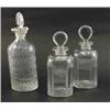 Image 1 : A pair of George III spirit decanters, engraved 'Rum' and 'Shrub', each with cut decoration and s...