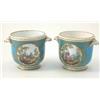 Image 1 : A pair of 19th century Sevres cache pots, painted with figures and woodland panels in gilt reserv...