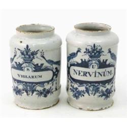A pair of early 18th century delftware drug jars, to contain 'Nervinum' and 'Violarum', each pain...