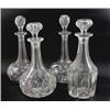 Image 1 : A pair of cut glass decanters, of globe and shaft form (12in.) and two other decanters, each with...