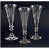 Image 1 : Eight near-matching champagne flutes, on knopped stems, 7in....
