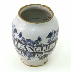 An 18th century Dutch delft drug jar, with painted label "Mel:Anglic", chips, long crack, 6.75in....