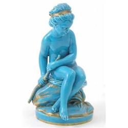 A Victorian turquoise-glazed figure, probably Minton, nude lady seated with bow, gilt detail, unm...