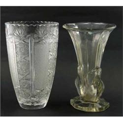 A glass vase, cut with star whorls (10in.) and a pressed glass vase - 9.5in....