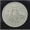 Image 1 : A Royal Copenhagen circular bisque wall plaque, moulded with a cherub group, 14in....
