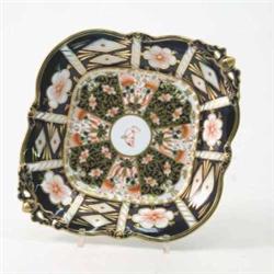 A Royal Crown Derby square dish, painted with a Japan pattern, on pierced feet, date code 1924, 9...