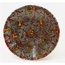 A Poole pottery charger, with foliate glaze-effects in grey against a vivid crimson ground, 16in....