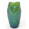 Image 1 : A Loetz iridescent green glass vase, with undulating rim and pinched body, 10in....
