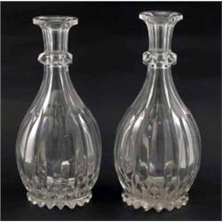 A pair of slice and facet cut glass decanters, 10.5ins...
