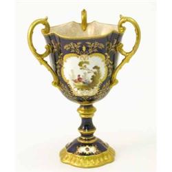 A Coalport three handled vase, painted with exotic birds and flowers by F. Howard, (a.f.) 11ins...