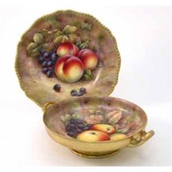 A bone china two-handled bowl, painted with fruit in style of Royal Worcester (9in.) and a simila...