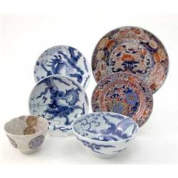 An 18th century Chinese Imari dish, painted in underglaze blue, iron-red and gilt (8in. - chipped...