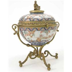 A gilt metal mounted Imari bowl and cover, 8ins...