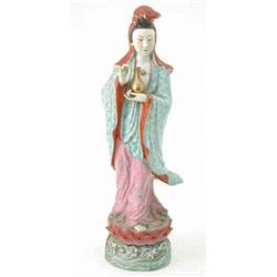 A Japanese polychrome porcelain figure of Kwan Yin, 20.5ins...