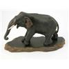 Image 1 : A Japanese bronze model of an elephant, with ivory tusks, 14ins, on hardwood stand...
