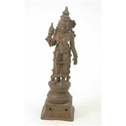 An Indian bronze figure of Parvati, modelled holding a torch 12.5ins...