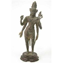 An indian brass figure of Vishnu, modelled standing on plinth 14ins...