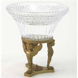 A French Empire design cut glass comport, supported on three ormolu caryatids and a triform base,...