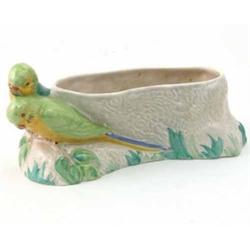 A Clarice Cliff planter, modelled with two parrots to side, 10in....