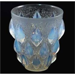 A Lalique opalescent glass 'Rampillon' vase, cat. ref. 991, a design of raised lozenges against a...