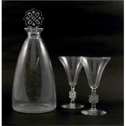 A Lalique clear glass 'Molsheim' decanter and six wine glasses en suite, circa 1930, decanter 10i...