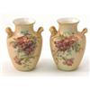 Image 1 : A pair of Royal Worcester two-handled vases, painted with flowers against a blush ivory ground, d...