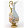 Image 1 : A Royal Worcester ewer, painted with a heron and desert landscape in bright colours against a sky...