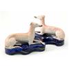 Image 1 : A pair of Victorian greyhound inkwells, each recumbent on blue-glazed cushion base, 6.25in. long...