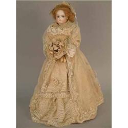 A French fashion doll, formerly attributed to Madame Huret circa 1860, bisque shoulder head with...