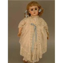 A Jumeau bisque doll, circa 1880, with fixed glass paperweight eyes, open mouth, pierced ears, on...