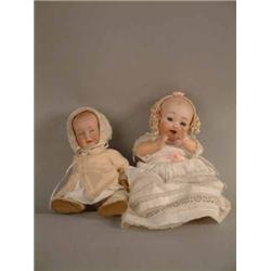 An Einco bisque character doll, impressed O, with intaglio eyes and painted hair to dome head, (1...