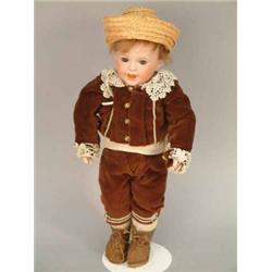 An SFBJ bisque boy doll, mould 236, with sleeping eyes, and laughing mouth, on jointed compositio...