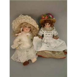 A German bisque doll, impressed 3007, with sleeping eyes and open mouth, on clothed kid leather b...