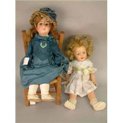 A Limbach bisque doll, with sleeping eyes, open mouth and jointed composition body (24ins) on rus...