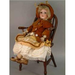 An Armand Marseille bisque doll, mould 390, with sleeping eyes and open mouth, on velvet-clothed,...