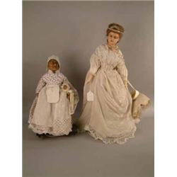 A wax over composition Princess Alexandra- type doll, with cloth body, jewellery and full-length...