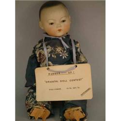 An Armand Marseille Oriental "My Dream Baby" bisque doll, mould 353 with sleeping eyes and closed...
