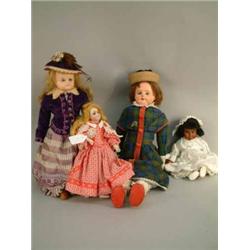 A French bisque doll, moulded G. D., Paris, (12ins) and three composition dolls, all clothed, as...
