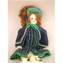 An S.F.B.J. bisque doll, moulded 201, with sleeping eyes and open mouth, on jointed composition b...