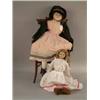 Image 1 : A large Victorian wax over composition shoulder doll, wire mechanism operating glass eyes, clothe...