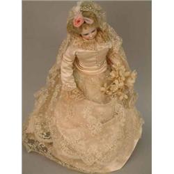 A 19th century French bisque fashion doll, swivel-head with fixed blue glass eyes, closed mouth a...