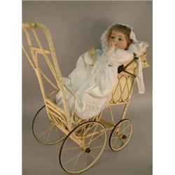 A large Simon & Halbig bisque baby doll, mould 126, with squeak, sleeping eyes and open mouth, on...