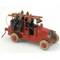 A John Hill & Co. fire engine, registration JHCO 1934, hollow-cast lead finished in red, complete...