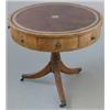 Image 1 : An early 19th century mahogany drum table, with later leathered top, four real and four dummy dra...