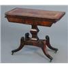Image 1 : A Regency mahogany and ebony strung card table, with rounded rectangular crossbanded top on four...