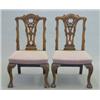 Image 1 : A set of eight Chippendale design mahogany dining chairs, with carved pierced splat backs on cabr...