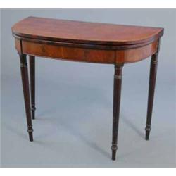 A George III mahogany demi lune card table, with satinwood banded top on tapered legs, 3ft...