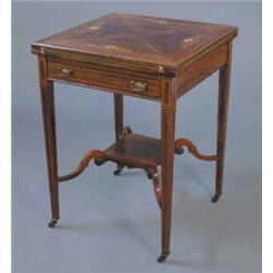 An Edwardian inlaid rosewood envelope card table, with drawer on square tapered legs with underst...