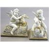 Image 1 : A pair of 19th century Continental painted limewood or pine groups, each of a cherub riding on th...